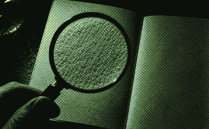 A magnifier over a passport page.